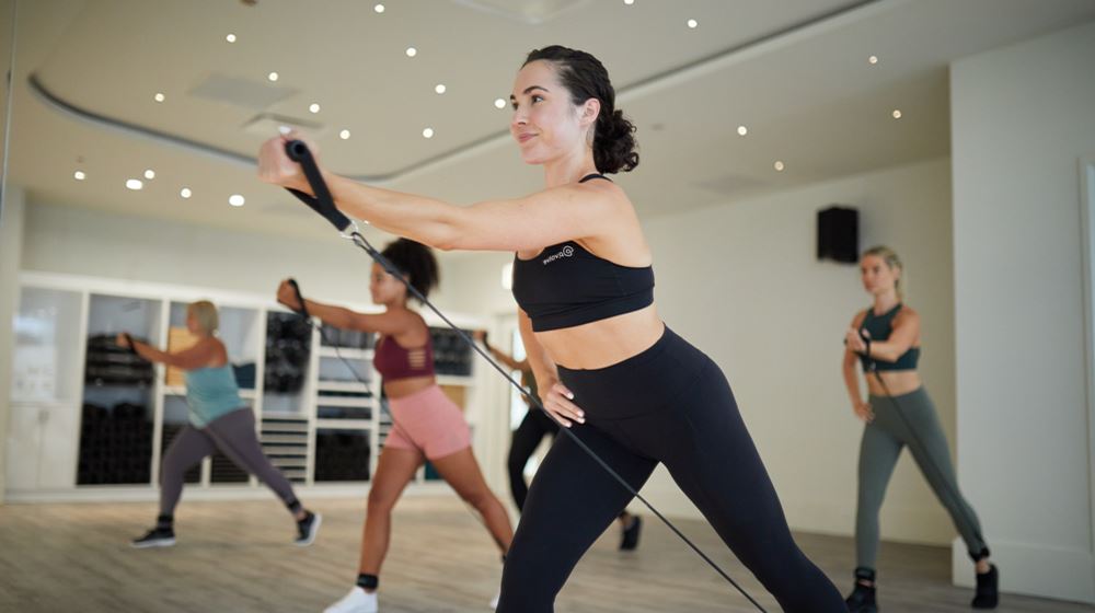Group of women use p.3 trainer in the P.volve studio