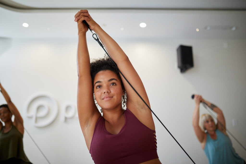 Image of three women working out at a P.volve studio
